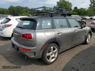 2017 MINI Clubman Cooper S with VIN WMWLU5C55H2F24329, listed as a Copart auction lot 67163314 with 129,818 mi miles and Salvage Title. Bid and sale history available at carsss.com. Image 3.