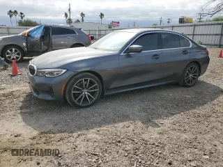 2020 BMW 3 Series 330i with VIN 3MW5R1J01L8B05802, listed as a Copart auction lot 52021825 with 86,214 mi miles and Salvage title. Bid and sale history available at DreamBid. Image 1.