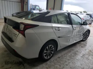 2020 Toyota Prius L Eco с VIN JTDKARFU2L3120017, выставлен на аукционе Copart как лот 64256835 с пробегом 25 278 миль миль и Списание • Salvage title. История ставок и продаж доступна на DreamBid. Изображение 3.