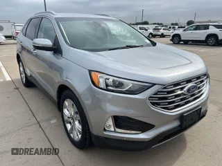 2020 Ford Edge Titanium z VIN 2FMPK3K95LBA30633, wystawiony jako IAAI lot #42473515 z przebiegiem 104 190 mil mil oraz . Historia ofert i sprzedaży dostępna na DreamBid. Obrazek 2.