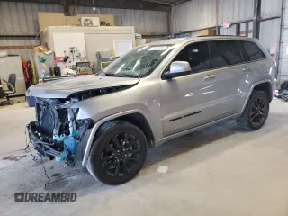 2020 Jeep Grand Cherokee Laredo E with VIN 1C4RJFAG2LC209889, listed as a Copart auction lot 71600274 with 100,537 mi miles and Salvage title. Bid and sale history available at DreamBid. Image 1.