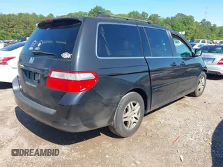 2006 Honda Odyssey EX-L with VIN 5FNRL387X6B080838, listed as a IAAI auction lot 42153641 with 255,438 mi miles and . Bid and sale history available at DreamBid. Image 4.