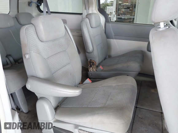2009 Chrysler Town & Country Touring with VIN 2A8HR54119R584798, listed as a IAAI auction lot 42183484 with 174,871 mi miles and . Bid and sale history available at DreamBid. Image 8.