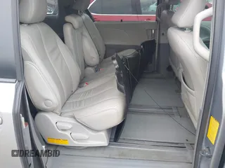 2012 Toyota Sienna XLE AAS with VIN 5TDYK3DC5CS260236, listed as a IAAI auction lot 41861457 with 123,530 mi miles and . Bid and sale history available at DreamBid. Image 8.