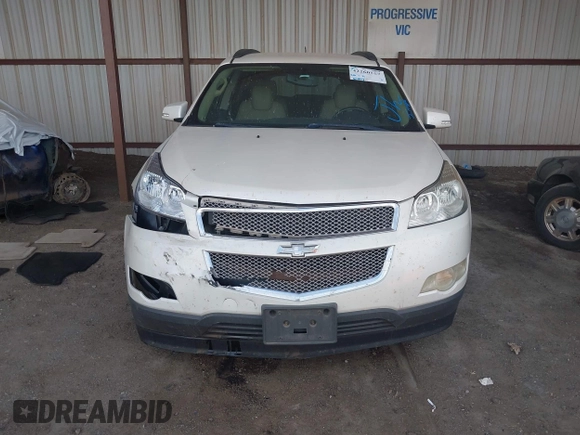 2011 Chevrolet Traverse LTZ z VIN 1GNKRLEDXBJ326016, wystawiony jako IAAI lot #42260167 z przebiegiem 163 447 mil mil oraz . Historia ofert i sprzedaży dostępna na DreamBid. Obrazek 12.