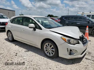 2012 Subaru Impreza Premium with VIN JF1GPAC68CG231570, listed as a Copart auction lot 62942705 with 115,833 mi miles and Salvage title. Bid and sale history available at DreamBid. Image 4.