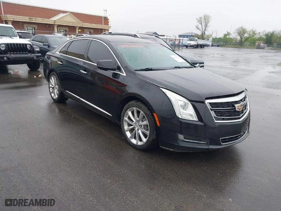 2016 Cadillac XTS Livery Package with VIN 2G61U5S38G9136327, listed as a IAAI auction lot 41935174 with 136,672 mi miles. Bid and sale history available at carsss.com. Image 1.