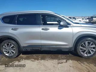 2020 Hyundai Santa Fe Limited with VIN 5NMS5CAD6LH304340, listed as a IAAI auction lot 41796115 with 56,989 mi miles. Bid and sale history available at carsss.com. Image 13.