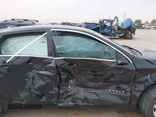 2017 Chevrolet Impala LT with VIN 2G1105S3XH9188531, listed as a IAAI auction lot 41824206 with 98,552 mi miles and . Bid and sale history available at DreamBid. Image 12.