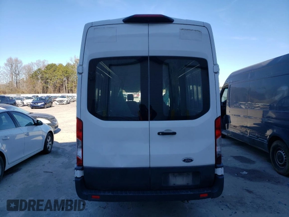 2021 Ford Transit Cargo с VIN 1FTBR3X89MKA77102, выставлен на аукционе Copart как лот 85972654 с пробегом 77 145 миль миль и Списание • Salvage title. История ставок и продаж доступна на DreamBid. Изображение 6.