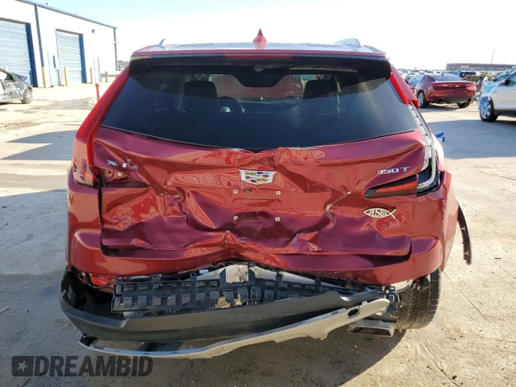 2020 Cadillac XT4 FWD Premium Luxury z VIN 1GYFZCR49LF085682, wystawiony jako Copart lot #47274325 z przebiegiem 52 834 mil mil oraz Szkody całkowita. Historia ofert i sprzedaży dostępna na DreamBid. Obrazek 6.