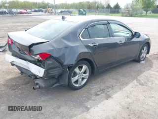 2010 Acura TSX z VIN JH4CU2F6XAC033773, wystawiony jako IAAI lot #42238614 z przebiegiem 200 944 mil mil oraz . Historia ofert i sprzedaży dostępna na DreamBid. Obrazek 4.