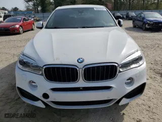 2015 BMW X6 xDrive35i with VIN 5UXKU2C55F0F96006, listed as a Copart auction lot 50830585 with 128,479 mi miles and Salvage Title. Bid and sale history available at carsss.com. Image 5.