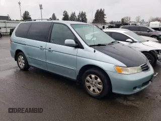 2004 Honda Odyssey EX with VIN 5FNRL18634B015984, listed as a Copart auction lot 48717675 with 137,905 mi miles and Salvage Title. Bid and sale history available at DreamBid. Image 4.