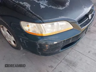 1998 Honda Accord EX z VIN 1HGCG6679WA267142, wystawiony jako IAAI lot #42146608 z przebiegiem 233 512 mil mil oraz . Historia ofert i sprzedaży dostępna na DreamBid. Obrazek 13.