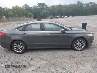 2017 Ford Fusion SE z VIN 3FA6P0HD6HR174945, wystawiony jako IAAI lot #42416548 z przebiegiem 128 410 mil mil oraz . Historia ofert i sprzedaży dostępna na DreamBid. Obrazek 13.