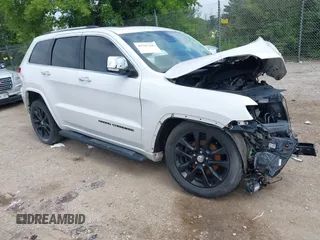 2017 Jeep Grand Cherokee Overland with VIN 1C4RJFCG4HC890187, listed as a IAAI auction lot 42707290 with Not provided miles and . Bid and sale history available at DreamBid. Image 1.