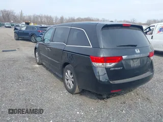 2017 Honda Odyssey EX-L with VIN 5FNRL5H65HB026014, listed as a IAAI auction lot 41719790 with 61,429 mi miles and . Bid and sale history available at DreamBid. Image 3.