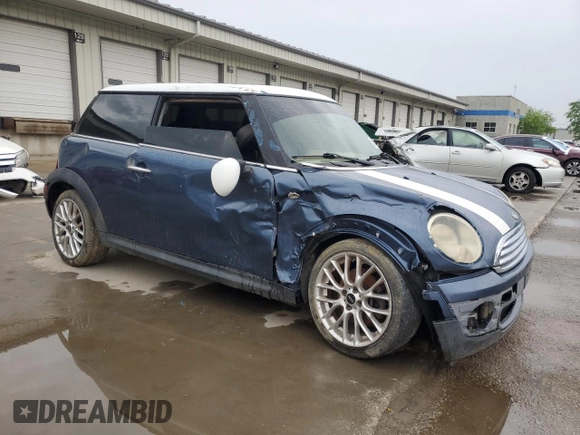 2010 MINI Hardtop with VIN WMWMF3C59ATZ28119, listed as a Copart auction lot 56213355 with 179,994 mi miles and Non Repairable. Bid and sale history available at DreamBid. Image 4.