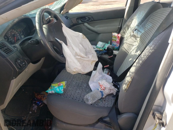 2006 Ford Focus S with VIN 1FAFP34N56W181928, listed as a Copart auction lot 59933385 with Not provided miles and Salvage title. Bid and sale history available at DreamBid. Image 7.