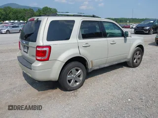 2009 Ford Escape Limited z VIN 1FMCU94729KB00689, wystawiony jako IAAI lot #42488311 z przebiegiem 271 726 mil mil oraz . Historia ofert i sprzedaży dostępna na DreamBid. Obrazek 4.