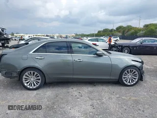 2016 Cadillac CTS Luxury Collection RWD with VIN 1G6AR5SXXG0108544, listed as a IAAI auction lot 41985630 with 86,014 mi miles and . Bid and sale history available at DreamBid. Image 14.