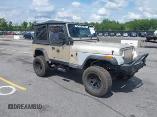 1995 Jeep Wrangler S z VIN 1J4FY19P7SP242989, wystawiony jako IAAI lot #42241996 z przebiegiem 203 520 mil mil oraz . Historia ofert i sprzedaży dostępna na DreamBid. Obrazek 1.