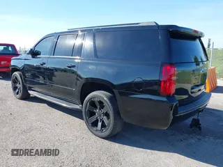 2019 Chevrolet Suburban Premier with VIN 1GNSKJKJ1KR100936, listed as a IAAI auction lot 40489121 with 97,884 mi miles and . Bid and sale history available at DreamBid. Image 3.