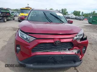 2019 Toyota RAV4 XLE with VIN JTMP1RFV2KD021348, listed as a IAAI auction lot 42198925 with 130,838 mi miles and . Bid and sale history available at DreamBid. Image 6.