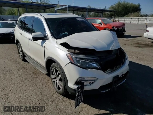 2017 Honda Pilot Touring with VIN 5FNYF6H92HB092491, listed as a Copart auction lot 76141434 with 56,002 mi miles and Salvage Title. Bid and sale history available at carsss.com. Image 12.