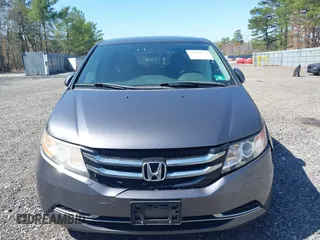 2016 Honda Odyssey SE with VIN 5FNRL5H39GB048487, listed as a IAAI auction lot 42059132 with 140,411 mi miles and . Bid and sale history available at DreamBid. Image 12.