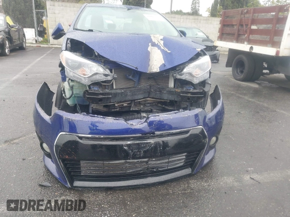 2014 Toyota Corolla L with VIN 5YFBURHE8EP173523, listed as a IAAI auction lot 41802729 with 77,336 mi miles and . Bid and sale history available at DreamBid. Image 12.