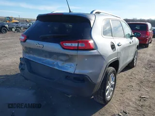 2014 Jeep Cherokee Latitude with VIN 1C4PJMCSXEW125737, listed as a IAAI auction lot 41863778 with 120,226 mi miles. Bid and sale history available at carsss.com. Image 4.