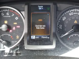 2021 Toyota Tacoma SR with VIN 3TMCZ5AN2MM405869, listed as a IAAI auction lot 42094533 with 78,449 mi miles and . Bid and sale history available at DreamBid. Image 16.