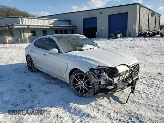 2021 Genesis G70 2.0T with VIN KMTG44LAXMU070314, listed as a Copart auction lot 88990385 with 52,517 mi miles and Salvage title. Bid and sale history available at DreamBid. Image 13.