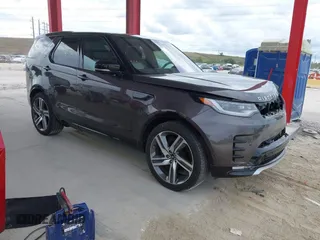2023 Land Rover Discovery Metropolitan Edition with VIN SALRW4EU9P2467157, listed as a IAAI auction lot 41203156 with 32,071 mi miles. Bid and sale history available at carsss.com. Image 1.