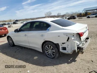 2014 Infiniti Q50 Premium z VIN JN1BV7AP4EM683628, wystawiony jako Copart lot #50084865 z przebiegiem 130 543 mil mil oraz Szkoda całkowita • Salvage title. Historia ofert i sprzedaży dostępna na DreamBid. Obrazek 2.