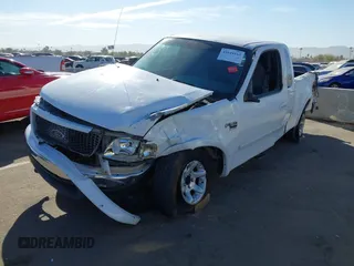 1999 Ford F-150 XL с VIN 1FTRX18L0XKB29703, выставлен на аукционе IAAI как лот 41644163 с пробегом Не указан миль и . История ставок и продаж доступна на DreamBid. Изображение 2.