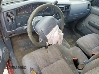 1997 Toyota Tacoma z VIN 4TAVN52N2VZ327902, wystawiony jako Copart lot #57450935 z przebiegiem 300 278 mil mil oraz Szkoda całkowita • Salvage title. Historia ofert i sprzedaży dostępna na DreamBid. Obrazek 8.