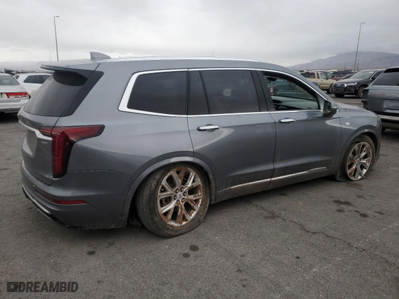 2020 Cadillac XT6 FWD Premium Luxury with VIN 1GYKPCRS5LZ201302, listed as a Copart auction lot 47898165 with 61,527 mi miles and Salvage Title. Bid and sale history available at carsss.com. Image 3.