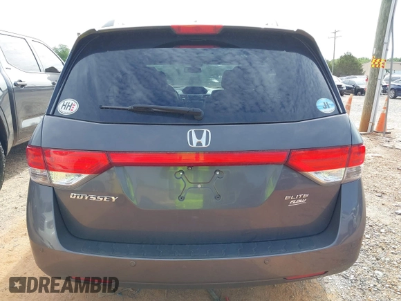 2015 Honda Odyssey Touring Elite z VIN 5FNRL5H97FB060981, wystawiony jako IAAI lot #42289631 z przebiegiem 160 947 mil mil oraz . Historia ofert i sprzedaży dostępna na DreamBid. Obrazek 16.