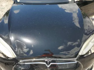 2013 Tesla Model S Performance с VIN 5YJSA1CP8DFP20786, выставлен на аукционе Copart как лот 61035395 с пробегом 140 119 миль миль и Списание • Salvage title. История ставок и продаж доступна на DreamBid. Изображение 11.