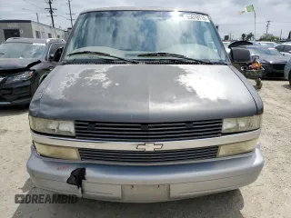 1999 Chevrolet Astro z VIN 1GNDM19WXXB114838, wystawiony jako Copart lot #55070715 z przebiegiem Nie podano mil oraz Szkody całkowita. Historia ofert i sprzedaży dostępna na DreamBid. Obrazek 5.