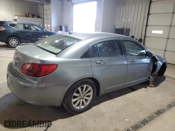2010 Chrysler Sebring Limited with VIN 1C3CC5FB2AN217908, listed as a Copart auction lot 84085404 with 181,317 mi miles and Salvage Title. Bid and sale history available at carsss.com. Image 3.