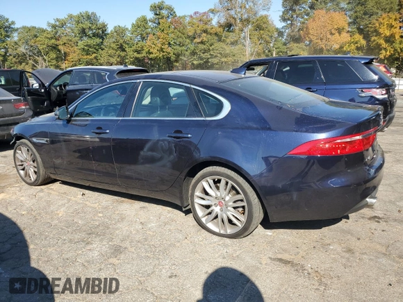 2016 Jaguar XF 35t Prestige with VIN SAJBK4BV6GCY17003, listed as a Copart auction lot 76336784 with 105,686 mi miles and Salvage Title. Bid and sale history available at carsss.com. Image 2.