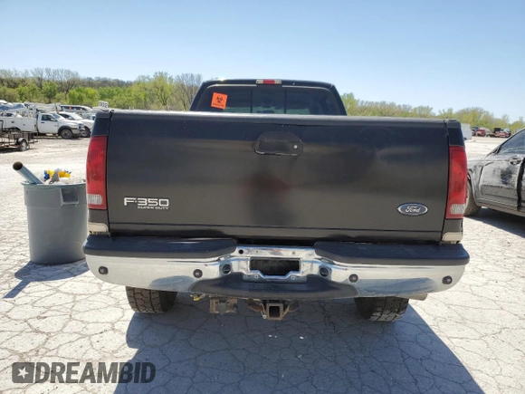 2001 Ford F-350 XL with VIN 3FTSW31F71MA76910, listed as a Copart auction lot 53083565 with 239,213 mi miles and Salvage Title. Bid and sale history available at DreamBid. Image 6.