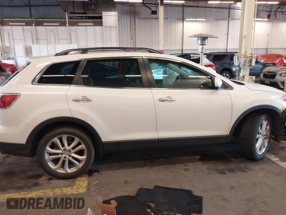 2012 Mazda CX-9 Grand Touring with VIN JM3TB3DV8C0359977, listed as a IAAI auction lot 41142648 with 115,979 mi miles. Bid and sale history available at carsss.com. Image 13.