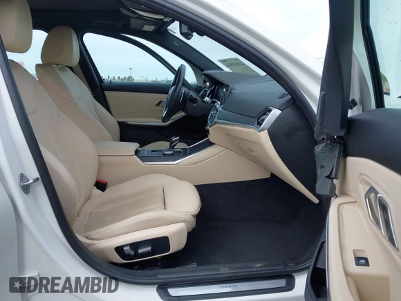 2021 BMW 3 Series 330i z VIN 3MW5R1J08M8C07261, wystawiony jako IAAI lot #41861814 z przebiegiem 87 426 mil mil oraz . Historia ofert i sprzedaży dostępna na DreamBid. Obrazek 5.