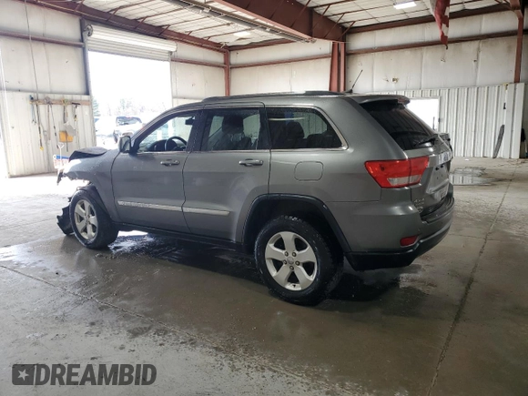 2013 Jeep Grand Cherokee Laredo with VIN 1C4RJFAG3DC612250, listed as a Copart auction lot 53155455 with 157,895 mi miles and Salvage Title. Bid and sale history available at carsss.com. Image 2.