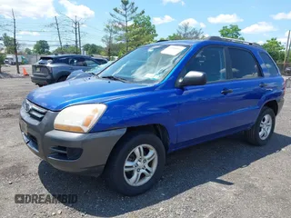 2007 Kia Sportage LX z VIN KNDJF723277303270, wystawiony jako IAAI lot #42388973 z przebiegiem 170 284 mil mil oraz . Historia ofert i sprzedaży dostępna na DreamBid. Obrazek 2.